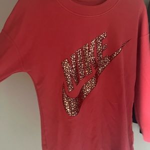 Womens Nike Pink sweatshirt with gold foil swoosh